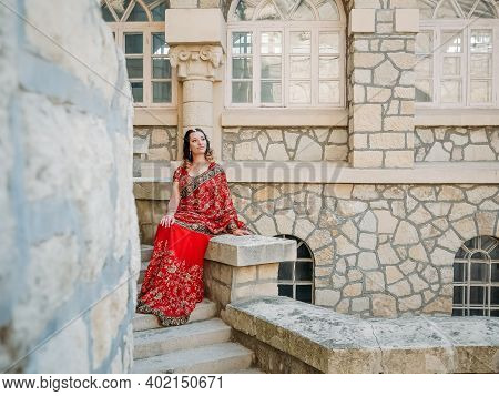Beautiful Ethnic Indian Saree. Young Woman In Red, Colorful, Sensual, Wedding And Very Feminine Outf