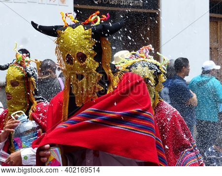 Cuenca, Ecuador - February 22, 2020: Carnival Parade In Cuenca City.  Participants As Characters Of 