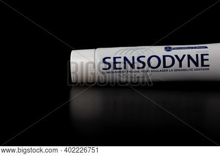 Sensodyne Toothpaste Tube On Black Background. Bucharest, Romania, 2021