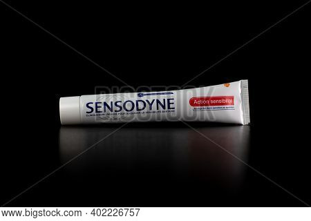 Sensodyne Toothpaste Tube On Black Background. Bucharest, Romania, 2021