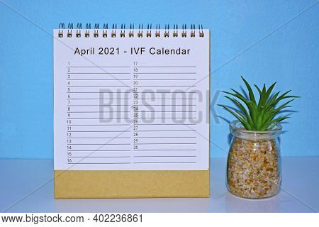 April 2021 Doctor Appointment Calendar With Blue Background And Potted Plant