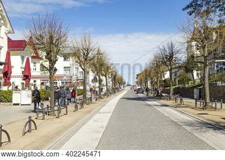 Zinnowitz, Germany - April 15, 2014: People Enjoy Walking Around The Scenic Old Houses In Zinnowitz,