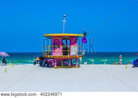Miami, Usa - July 27, 2010: People Enjoy Beachlife In South Miami With Clear Blue Sky.