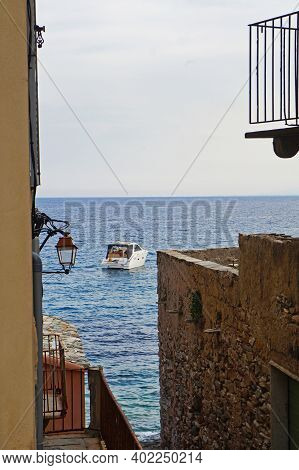 Sea View Between Two Houses In Erbalunga, Corsica, France. August 12, 2020. Editorial Photo