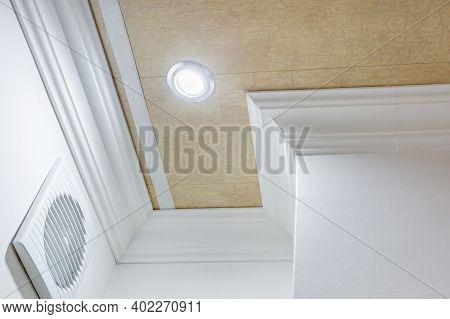Detail Of Corner Ceiling With Intricate Crown Molding. Suspended Ceiling And Drywall Construction In