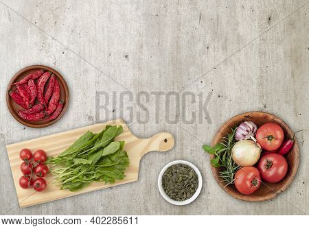 Salad Ingredients Over Wooden Table With Copy Space.