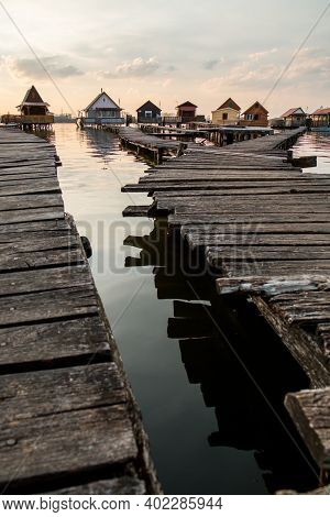 A Picture From Hungary, From A Place Called Bokod. The Local People Have The Wooden Cottages On Pylo