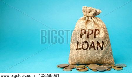 Money Bag With The Word Ppp Loan - Paycheck Protection Program. Loan Designed To Provide A Direct In