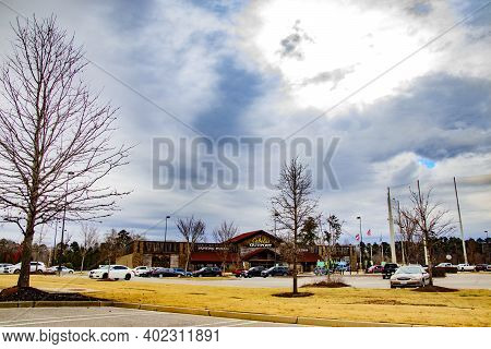 Augusta, Ga Usa - 01 07 21: Cabelas Outpost Retail Store On A Cloudy Day Distant View