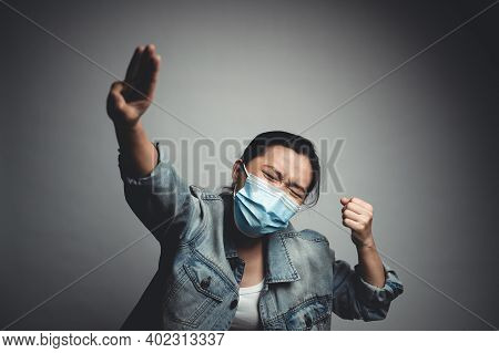 Asian Woman Wearing Protective Face Mask Showing Three Finger Isolated On White Background.
