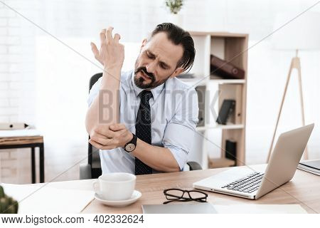 A Man's Arm Hurts.