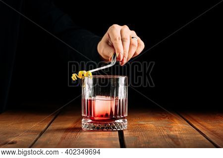 Making Negroni Cocktail In Old Fashion Glass