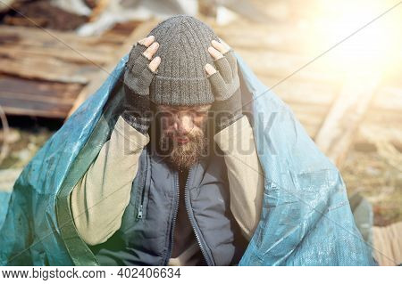 Sad And Upset Homeless And Unemployed Person In Ruins, Economic Collapse And Poverty, Job Loss, Unem