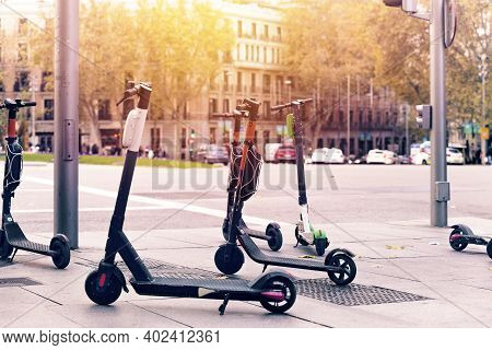 View Of Electric Scooter Parked In Madrid Town For Rent. Europe,spain