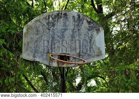 Very Old Abandoned Basketball Hoop That Is Falling Apart