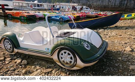 Solina, Poland - September 05, 2018: Paddle Boat (or Pedalo) In The Shape Of A Car. Entertainment Fo