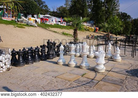 Solina, Poland - September 05, 2018: Huge Chess Pieces On The Beach. Entertainment For Tourists.