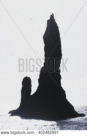 Reynisdrangar Basalt Sea Stack Rock Formation Atlantic Ocean Coast At Volcanic Black Sand Beach Reyn