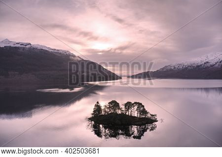 Ben Lomond At Loch Lomond During Pink Sunrise Sky In Scotland
