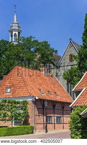 Half Timbered House And Church Tower In Ootmarsum, Netherlands
