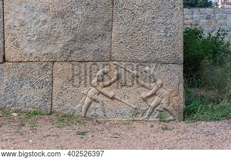 Hampi, Karnataka, India - November 5, 2013: Zanana Enclosure. Brown Stone Large Linear Building Is S
