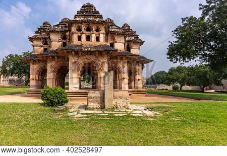 Hampi, Karnataka, India - November 5, 2013: Zanana Enclosure. Brown Stone Ruinous Lotus Mahal Buildi