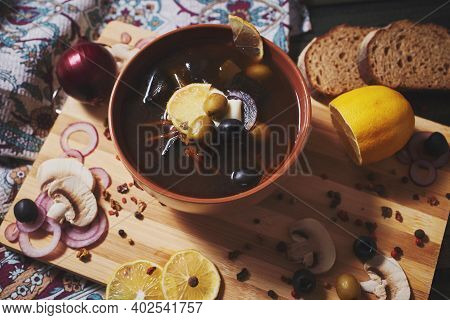 Top View Of Bowl With Vegetarian Mushroom Solyanka Soup, Traditional Saltwort Russian Soup. Ceramic 