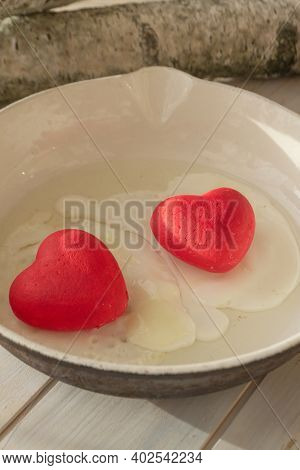 Cooked Egg With Red Hearts In A Fryer, Concept Of Belarusian Revolution, Vertical Image