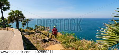 Professional Man Setting Slider Dolly Camera Taking Picture Landscape Nature View At Laem Promthep C
