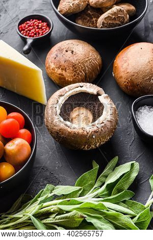 Garlicky Portabello Mushrooms Ingredients For Baking, Cheddar Cheese And Sage  On Black Background. 