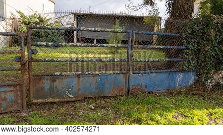 Old Retro Rusty Sttel Portal Of Dirty Used House Access Door Garden