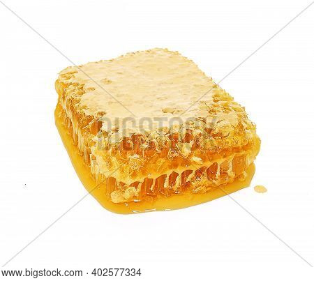 Honeycomb Piece. Honey Slice Isolated On White Background.