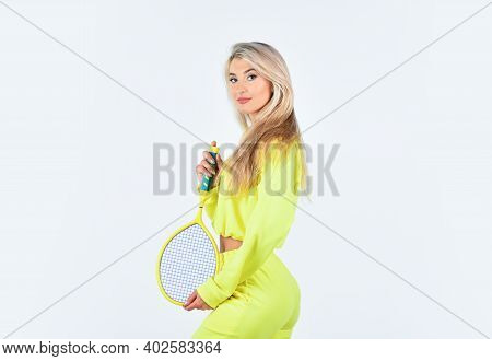 Relaxing After Training. Sporty Woman Hold Tennis Racquet. Female Tennis Player Isolated On White. G