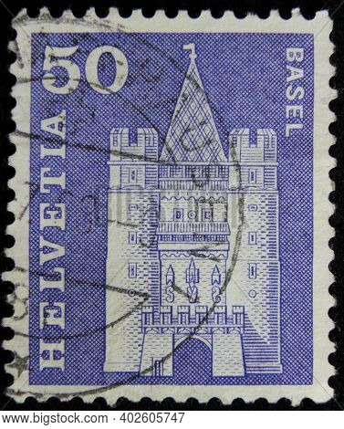 Istanbul, Turkey - December 26, 2020: Switzerland Stamp Shows Spalen Gate, Basel Circa 1960