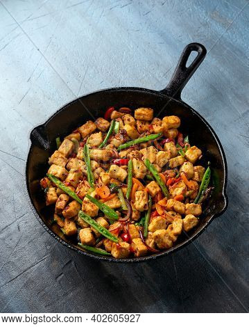 Vegetarian Meat Free Mycoprotein Pieces Vegetable Stir Fry Served In Cast Iron Skillet Frying Pan