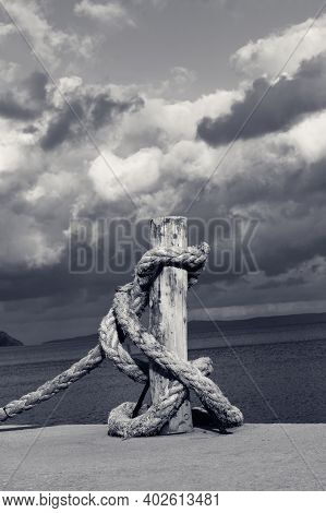 Rope On Seafront, Sea And Beautiful Cloudy Sky In Sun Summer Day. Turkey, Erdek, Coast Of Marmara. B