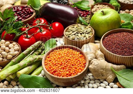 Different Vegetables, Seeds And Fruits As Background, Closeup. Healthy Diet