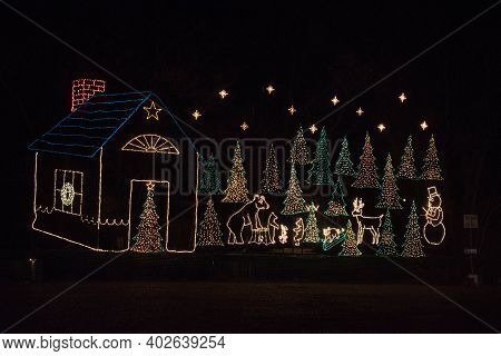 Bluffton, Oh December 23, 2020, Christmas Holiday Light Display Of A House And Christmas Trees
