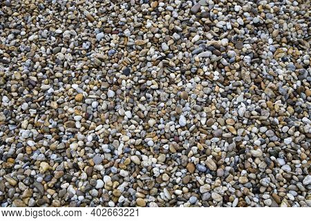 Nice Wet Colorful Pebblestones On A Pathway