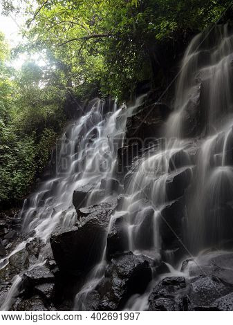 Long Exposure Panorama Of Tropical Air Terjun Kanto Lampo Waterfall Cascade Natural Rock Steps In Gi