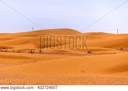 Bend Of The Ridge Of A Sand Dune In The Desert