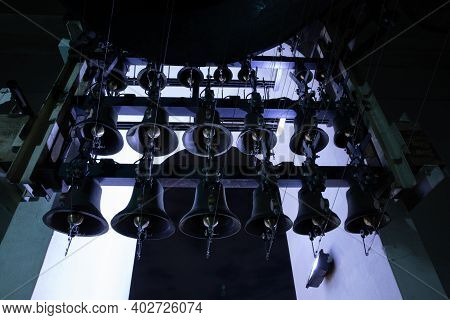 Variuos Of Bells Inside Of The Bell Tower Of St. Michaels Golden-domed Monastery At Night Light - Ky