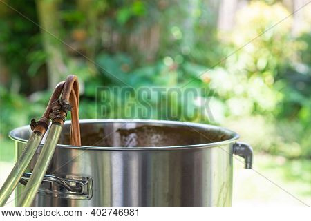 A Copper Immersion Heat Exchanger Is Used In The Craft Beer Process. Selective Focus. Homebrewing Pr