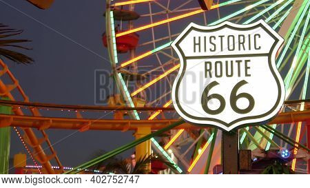 Santa Monica, Los Angeles, Usa - 28 Oct 2019: Iconic Road Sign Glowing, Historic Route 66. Famous Ca