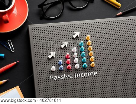 Passive Income Text With Pin Garph Chart On Business Table.vision To Success And Strategy Plan.