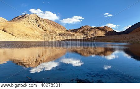 Pamir Mountains Near Pamir Highway, Evening View Of Small Lake And Mounts Mirroring In Lake, Tajikis