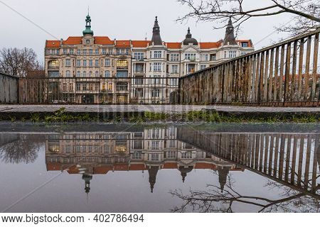 Wroclaw January 9 2020 Old Tenement Castle Building Reflected In Small Puddle