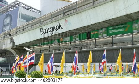 Bangkok, Thailand - 11 July, 2019: Pedestrians Walking On The Bridge Near Mbk And Siam Square Under 