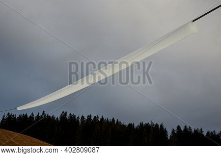Power Lines Frozen By A Large Layer Of Ice In The Shape Of A Cylinder With Icicles. Icing Loads The 