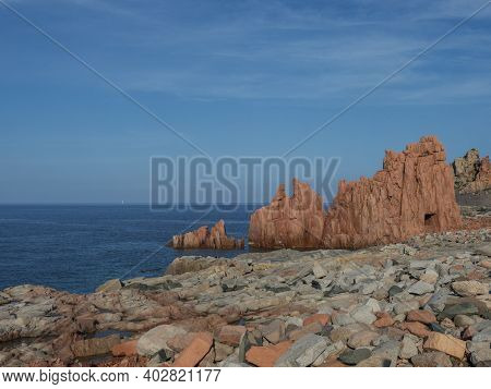 View Of Red Rocks Called Rocce Rosse At Mediterranean Sea Coastline In Arbatax Port, Penisula Of Tor
